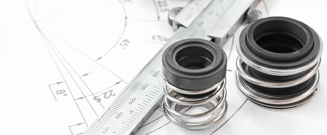 Mechanical Seals for prevent liquid leak for the industry with drawings on table working.